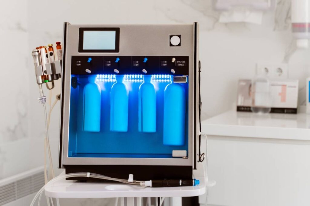 Professional HydraFacial machine in a modern dermatology clinic
