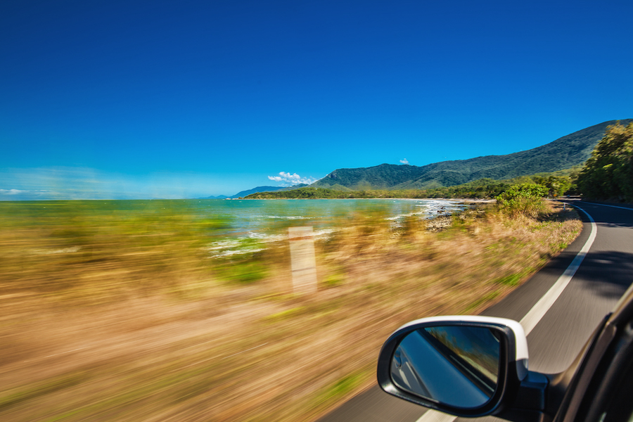 Road trip with motion blur along Ellis Beach near Palm Cove